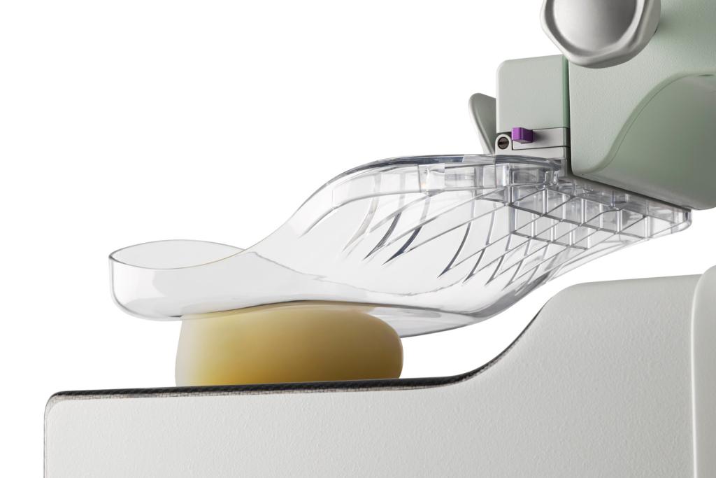 The SmartCurve breast stabilisation system is compressing a silicon ball on a digital mammography system
